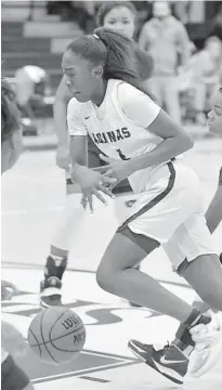  ??  ?? St. Thomas’ Karina Gordon blows past the Dillard defense during the first half Friday at South Plantation High School.