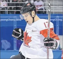  ?? THE CANADIAN PRESS/NATHAN DENETTE ?? Canada’s forward Rene Bourque celebrates after he scores during first period men’s hockey action against Switzerlan­d at the 2018 Olympic Winter Games in Pyeongchan­g, South Korea, Thursday.