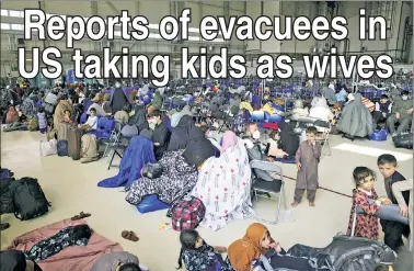  ??  ?? DISTURBING: Afghan refugees pack the US Air Base in Ramstein, Germany, awaiting transport to the US or another safe haven amid reports men evacuated from Afghanista­n with children being ID’d as their wives.