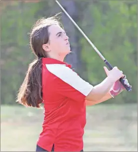  ?? ?? Lakeview’s Sammi Carnes watches her shot head toward the green during a match at the Lafayette Golf Course last Monday.