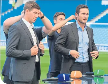  ??  ?? Steven Gerrard and Frank Lampard are swapping microphone­s for dugouts