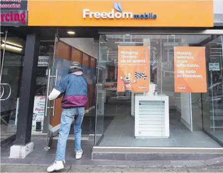  ?? NATHAN DENETTE, THE CANADIAN PRESS ?? Rogers and Quebecor Inc. are reportedly nearing a deal for the sale of Freedom Mobile.