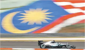  ??  ?? File photo of Mercedes’ Nico Rosberg of Germany in action during first practice at the Malaysia Grand Prix in Sepang. — AFP photo