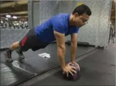  ??  ?? John Manoj Vastrad working out at 24 Hour Fitness in San Jose.