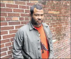  ?? JENNIFER BRETT / JBRETT@AJC.COM ?? “Get Out” writer and director Jordan Peele was honored as director of the year.