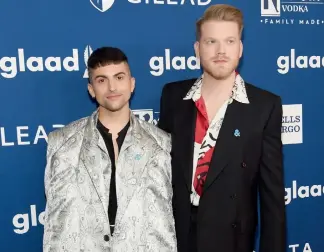  ??  ?? Mitch Grassi and Scott Hoying, of Pentatonix and Master of None’s Lena Waithe with Halle Berry at the GLAAD Awards