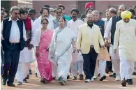  ??  ?? Mamata Banerjee along with her MPs, National Conference leader Omar Abdullah, and other MPs coming out after meeting with President Pranab Mukherjee in New Delhi.