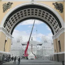  ?? WASHINGTON POST ?? A crane builds scaffoldin­g for an outdoor concert in Dvortsovay­a Square near the State Hermitage Museum in St. Petersburg.