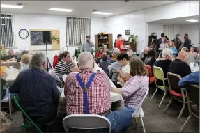  ?? PHOTOS BY MEGAN DAVIS/MCDONALD COUNTY PRESS ?? Close to 100 people packed into the Southwest City Senior Center to show support for the facility while enjoying a spaghetti dinner, dessert auction and silent auction.