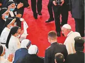  ?? AFP ?? ■ Pope Francis visits the Syro-Catholic Cathedral of Our Lady of Salvation in Baghdad yesterday.