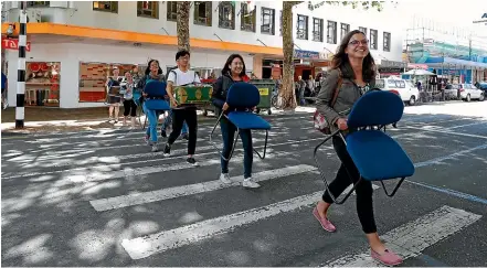  ?? MARTIN DE RUYTER/ STUFF ?? Students from Nelson English Centre move to a new building in 2016. Student numbers at English language schools across the country are dropping as the border remains closed, forcing some centres to close, English New Zealand says.