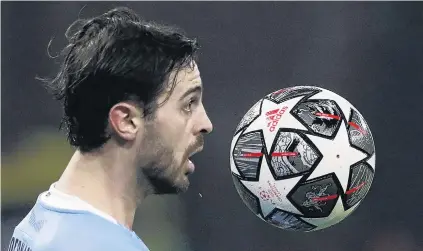  ?? PHOTO: REUTERS ?? Eye ball . . . Manchester City’s Bernardo Silva is about to chest the ball down during his team’s Champions League clash against Borussia Monchengla­dbach in Budapest yesterday.