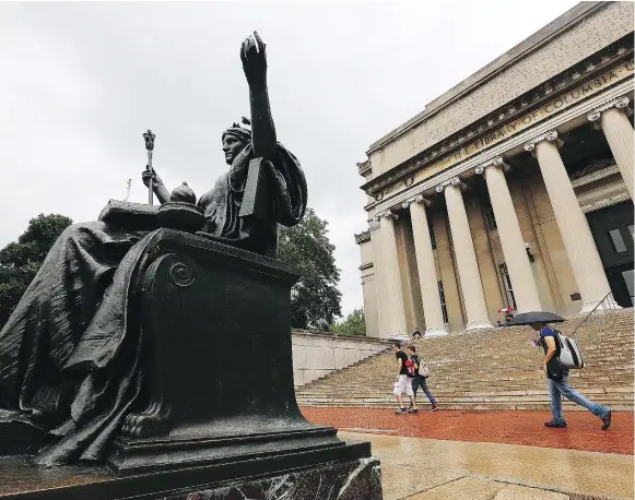  ?? — GETTY IMAGES FILES ?? Columbia University has suspended its wrestling program following the discovery of sexually explicit, homophobic and racist texts allegedly sent by team members. The wrestlers are banned until the school has a ‘full understand­ing of the facts.’