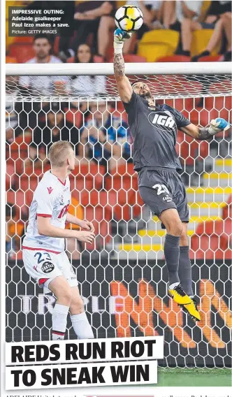  ?? Picture: GETTY IMAGES ?? IMPRESSIVE OUTING: Adelaide goalkeeper Paul Izzo makes a save.