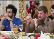  ?? RAMZAN KADYROV PRESS SERVICE VIA AP ?? In this video grab provided Tuesday by the Ramzan Kadyrov Press Service, shows Egypt forward Mohamed Salah and Chechen leader Ramzan Kadyrov while attending a banquet in Grozny, Russia, Friday. Mohamed Salah, who has been at the center of a controvers­y...