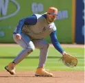  ?? JEFF ROBERSON/AP ?? Pete Alonso handles a ground ball during a spring training workout on Feb. 20 in Port St. Lucie, Fla.