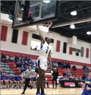  ?? NATE BARNES — THE NEWS-HERALD ?? Jevontae Jones dunks in the first half during Richmond Heights’ D-IV Norton District semifinal victory over Independen­ce on March 2.