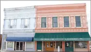  ?? LYNN KUTTER ENTERPRISE-LEADER ?? The State Review Board of Arkansas Historic Preservati­on Program has nominated two commercial districts in downtown Prairie Grove for the National Register of Historic Places. The North Mock Street Commercial Historic District includes these two...