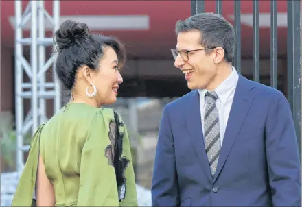  ?? AP PHOTO ?? Sandra Oh, left, and Andy Samberg smile at each other after rolling out the red carpet at the 76th annual Golden Globe Awards Preview Day at The Beverly Hilton on Thursday, in Beverly Hills, Calif.