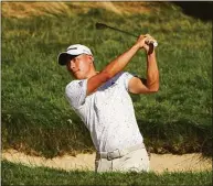  ?? Patrick Smith / Getty Images ?? Collin Morikawa plays a shot on the fifth hole during Friday’s second round of the U.S. Open at The Country Club in Brookline, Mass.