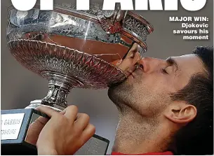  ??  ?? MAJOR WIN: Djokovic savours his moment