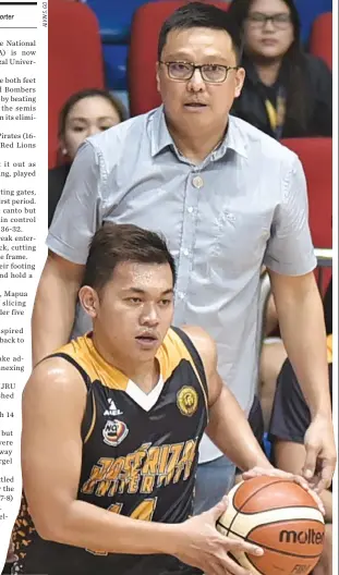  ??  ?? THE JRU HEAVY BOMBERS booked a semifinal spot in NCAA Season 93 after beating the Mapua Cardinals, 62-58, yesterday.