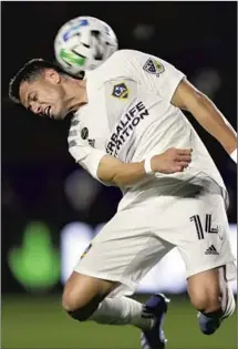  ?? Alex Gallardo Associated Press ?? JAVIER HERNÁNDEZ has gone on a Galaxy scoring spree. Chicharito’s league-high five goals have been big news in Mexico.