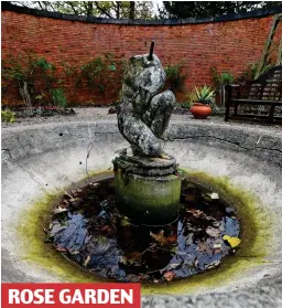  ??  ?? Forlorn: A water feature statue – missing its head ROSE GARDEN