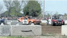  ?? POSTMEDIA FILE PHOTO ?? Last year's demolition derby, a first at the Virgil Stampede, drew large crowds and was considered a great success. It will be back Saturday afternoon.