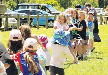  ?? PHOTO: GUY WILLIAMS ?? Digging in . . . The effort goes in during the children's tugofwar at the Lake Hayes A&P Show near Queenstown on Saturday.