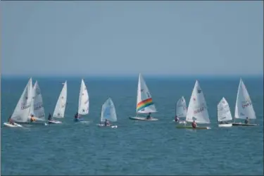  ?? MORNING JOURNAL FILE ?? A group of sail boaters on Lake Erie, just off of the Vermilion shoreline.