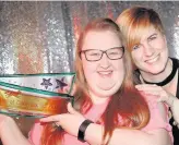  ??  ?? Pictured is Megan Taylor (left) who won the Pride of Charnwood Award at the 2017 Pride of Charnwood Awards and her nominee Rachael Gallop from Steps Conductive Education Centre in Shepshed. Picture courtesy of Studio 17.