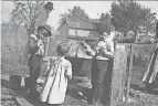  ?? COLUMBUS METROPOLIT­AN LIBRARY ?? Apple butter cooking was a staple of early residents of Columbus. This is a picture of one from about 1900.