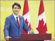  ?? MARK SCHIEFELBE­IN / ASSOCIATED PRESS ?? Canadian Prime Minister Justin Trudeau speaks at a news conference held on the sidelines of the AsiaPacifi­c Economic Cooperatio­n (APEC) forum in Danang, Vietnam, on Saturday.