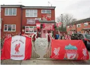  ?? — AP ?? A house decked out with Liverpool club’s flags ahead of their Champions League final against Real Madrid.