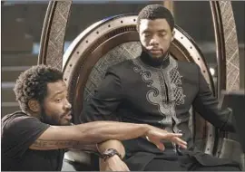  ?? Matt Kennedy Marvel Studios ?? RYAN COOGLER, left, directs Chadwick Boseman in “Black Panther.” A new study shows a historic increase in black directors helming Hollywood’s top films.