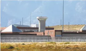  ?? Brennan Linsley / Associated Press 2015 ?? A guard tower looms over the federal Supermax prison in Colorado. Tough talk from Washington could reverse the trend of lower prison population­s.