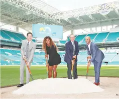  ?? — AFP photo ?? L-R Mark Sharpiro WME/IMG Co-President, Serena Williams, Stephen Ross, Miami Dolphins owner and James Blake,Tournament Director pose for a photograph at the ground breaking ceremony of the future home of the Miami Open begining in 2019 at Hard Rock...