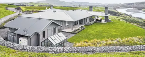  ?? Photos / Supplied ?? A stunning home overlookin­g the Tukituki River has won big at the Central North Island, East Coast & Hawke’s Bay Registered Master Builders House of the Year competitio­n.