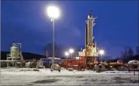  ?? RICHARD DREW — THE ASSOCIATED PRESS FILE ?? This is a natural gas drilling site in the Susquehann­a County township of New Milford, Pa. Natural gas producers drilled more than twice as many shale wells in the first half of 2017 compared to the same period last year.