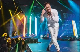  ?? ERIC JAMISON/INVISION/AP, FILE ?? Dan Reynolds of Imagine Dragons performs during the Vegas Strong Benefit concert in Las Vegas in December 2017.