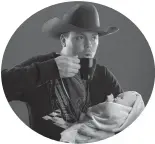  ??  ?? BEHIND THE SCENES:
Blake is just a dude wearing a cowboy hat, drinking a coffee, holding a baby doll. Totally normal.