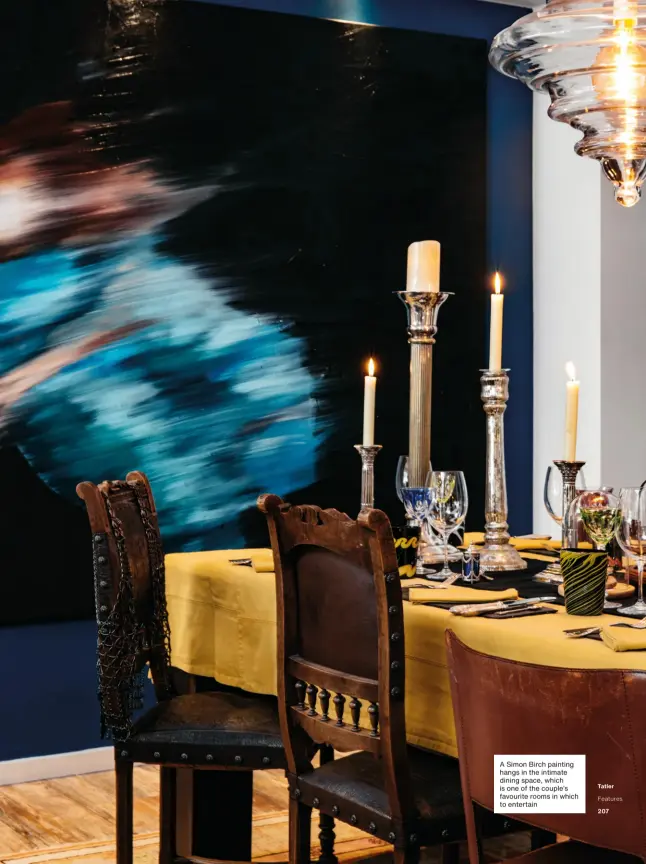  ??  ?? A Simon Birch painting hangs in the intimate dining space, which is one of the couple’s favourite rooms in which to entertain