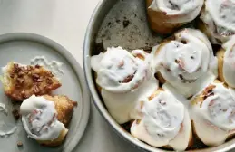  ?? © The New York Times Co. for The New York Times ?? Above: No-yeast cinnamon rolls. David Malosh, Left: World's Best Chocolate Cake. Ryan Liebe,