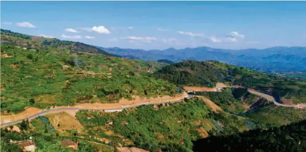  ??  ?? A section of the Rwanda-burundi transnatio­nal highway project constructe­d by STECOL Corporatio­n in western Rwanda. courtesy of STECOL Corporatio­n