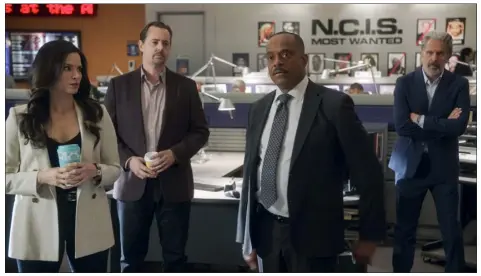  ?? CBS ENTERTAINM­ENT VIA AP ?? This image released by CBS shows, from left, Katrina Law as NCIS Special Agent Jessica Knight, Sean Murray as Special Agent Timothy Mcgee, Rocky Carroll as NCIS Director Leon Vance, and Gary Cole as FBI Special Agent Alden Parker in a scene from “NCIS.”