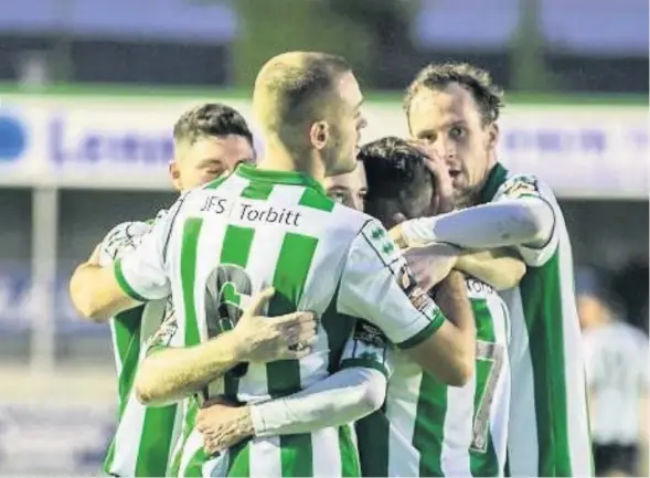  ?? BILL BROADLEY ?? ■ Blyth Spartans players celebrate scoring against Ashton United