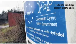  ??  ?? &gt; An EU funding sign in Ebbw Vale