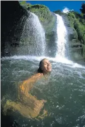  ?? GRENADA BOARD OF TOURISM ?? The Concord Waterfalls in Grenada has three falls near a forest reserve where visitors can take a dip in cool, crystal-clear waters.