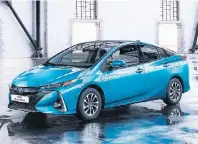  ?? FOTO: HERSTELLER ?? Der Toyota Prius Plug-in-Hybrid soll aufgrund seiner großen Reichweite sogar reinen Elektroaut­os Konkurrenz machen.